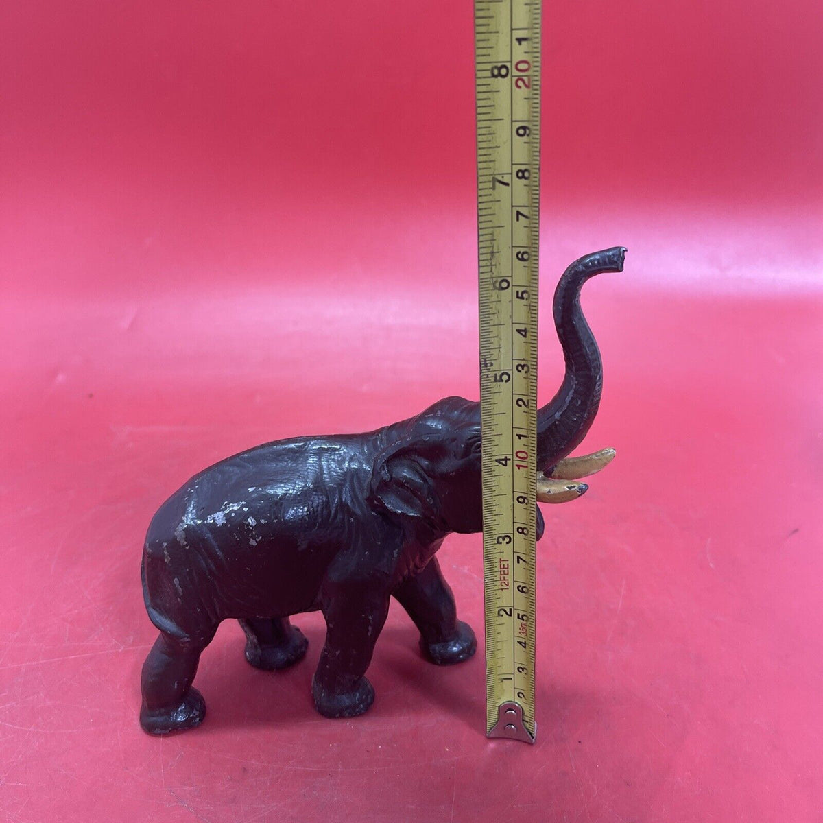 Antique hollow elephant figurine, original paint