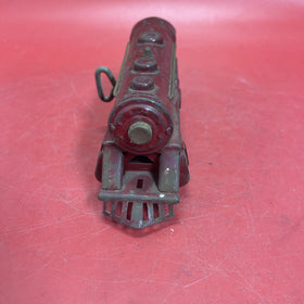 Vintage red locomotive, winding mechanism key