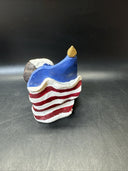 Set of Resting Eagles Figurines On American Flag