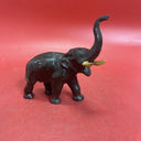 Antique hollow elephant figurine, original paint