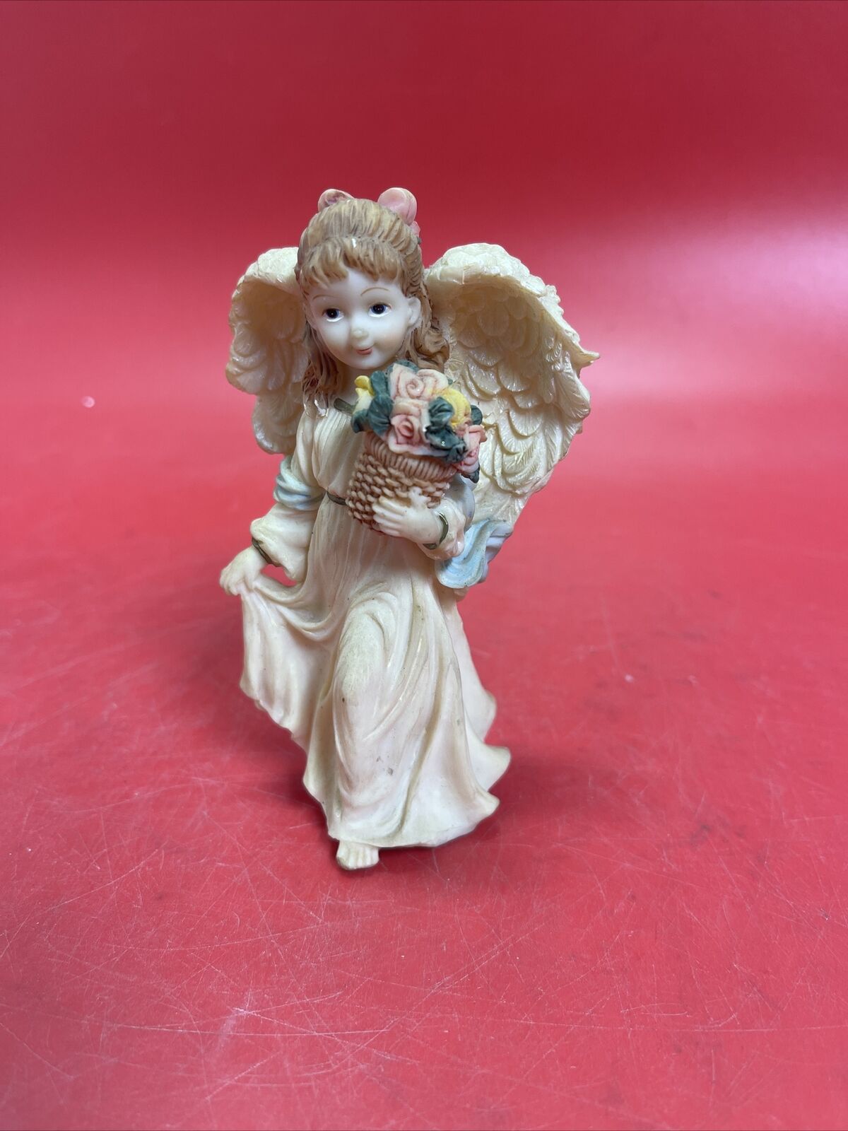 Vintage figurine ANGEL with flowers