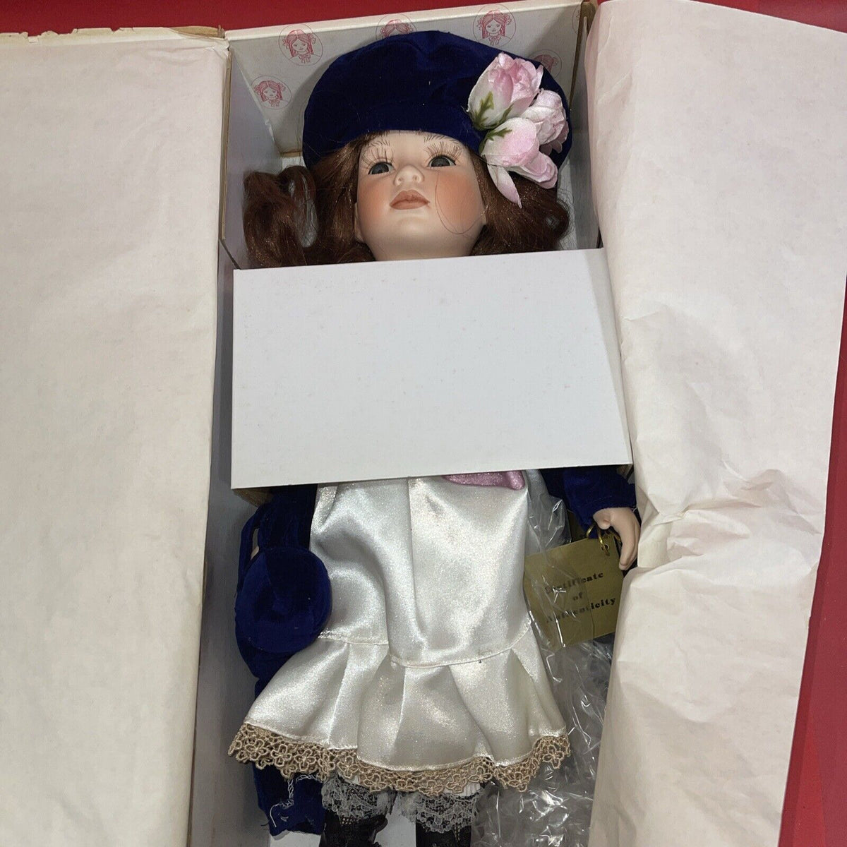 The Broadway Collection Porcelain Doll.