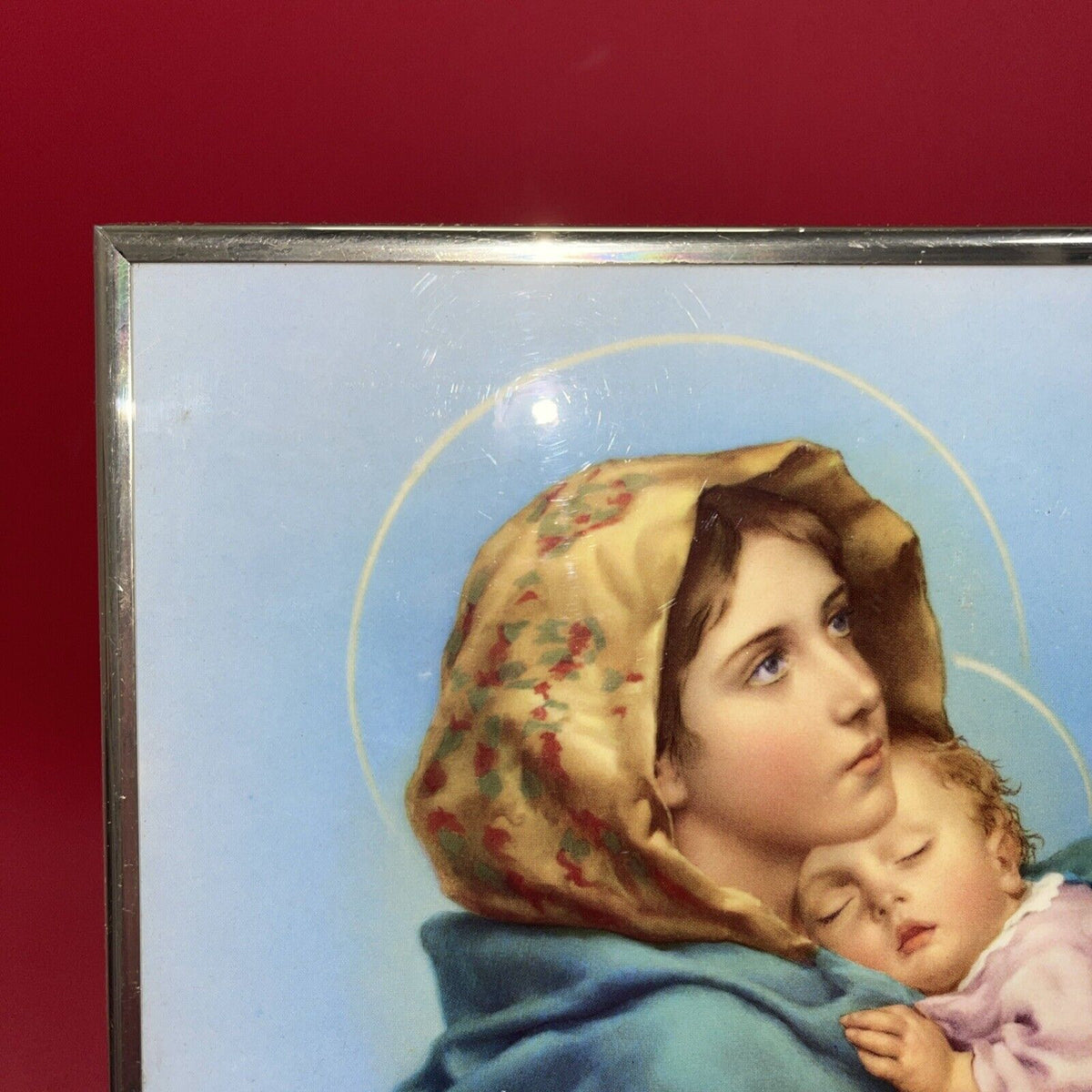 Madonna Of The Streets With Child Plaque  10”x8”in a frame