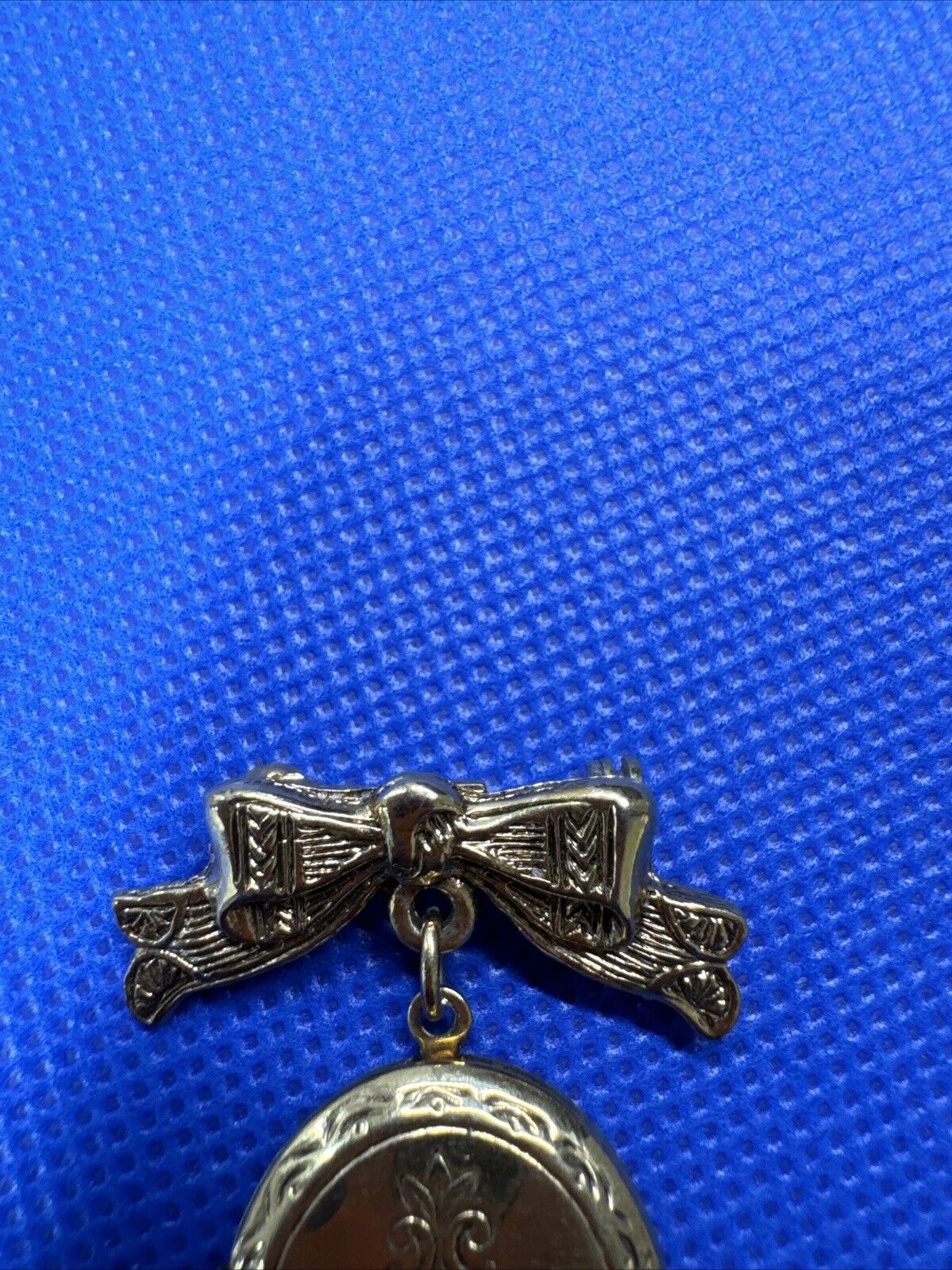 Vintage 1928 Jewelry Bow with Locket Dangle Gold Tone Brooch