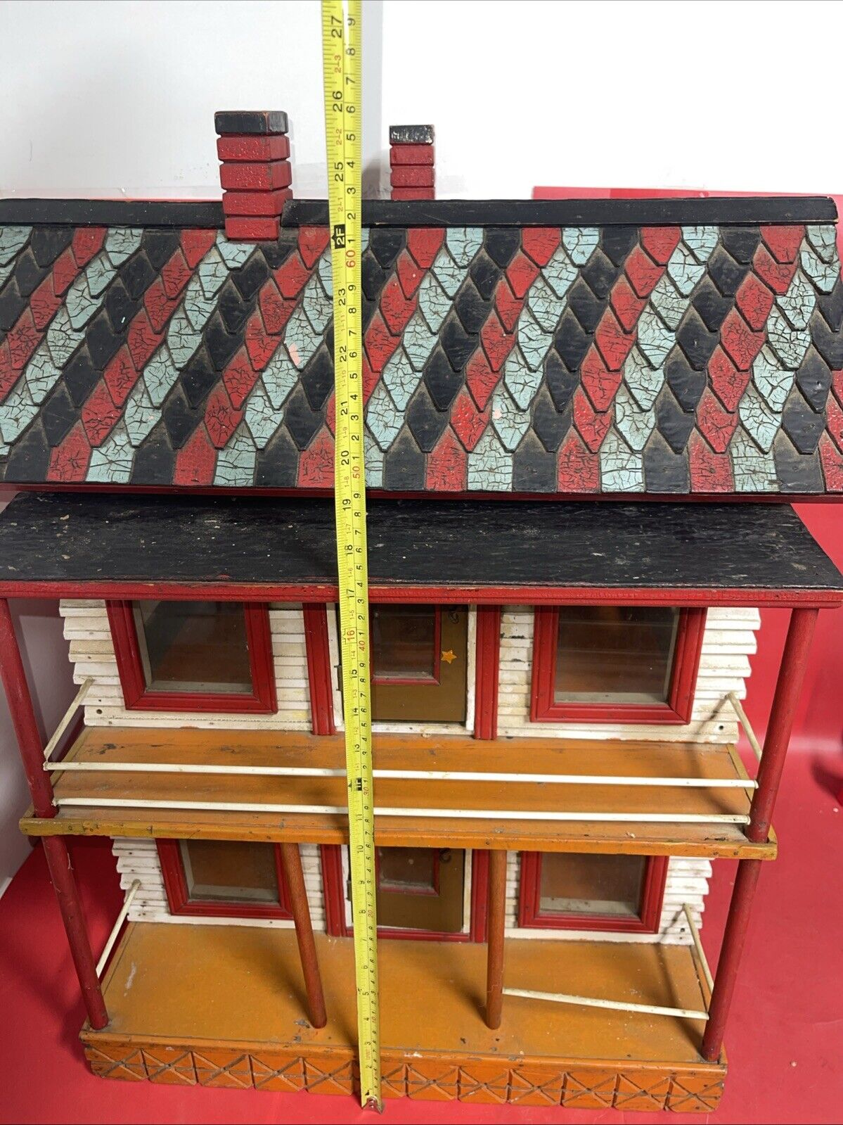 Vintage wooden dollhouse, two-story. Windows - red, removable roof