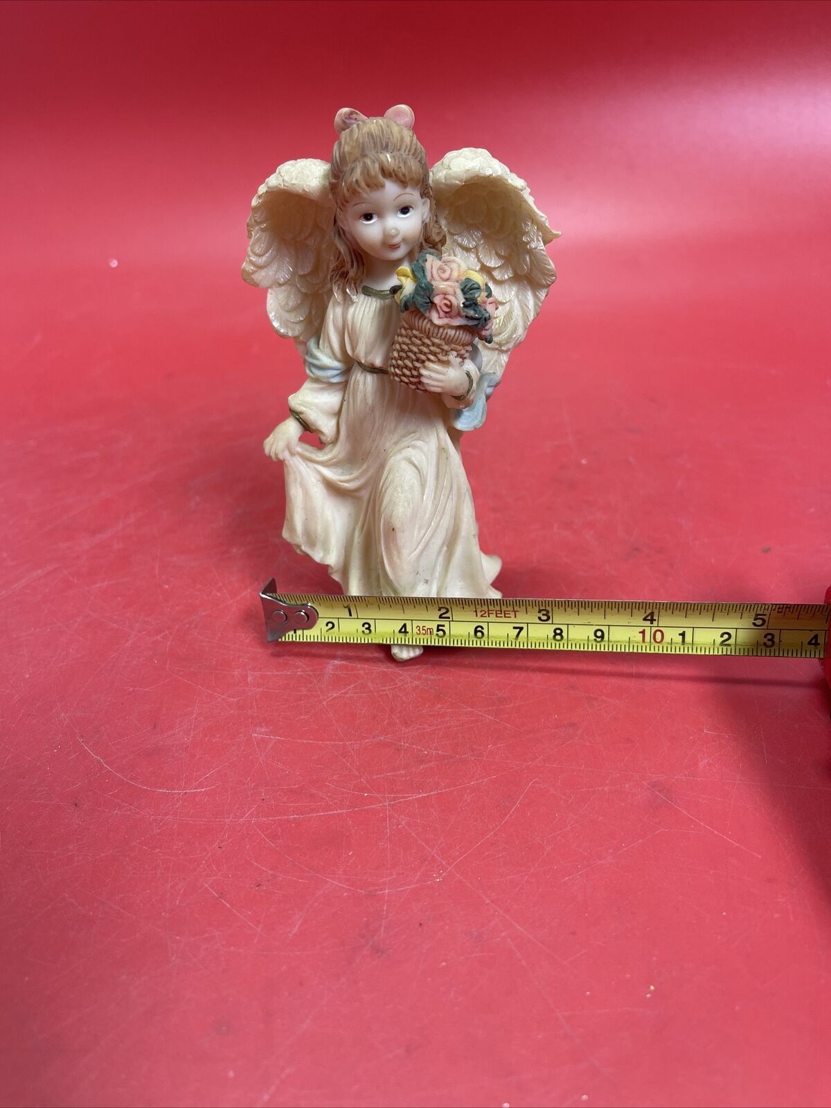 Vintage figurine ANGEL with flowers