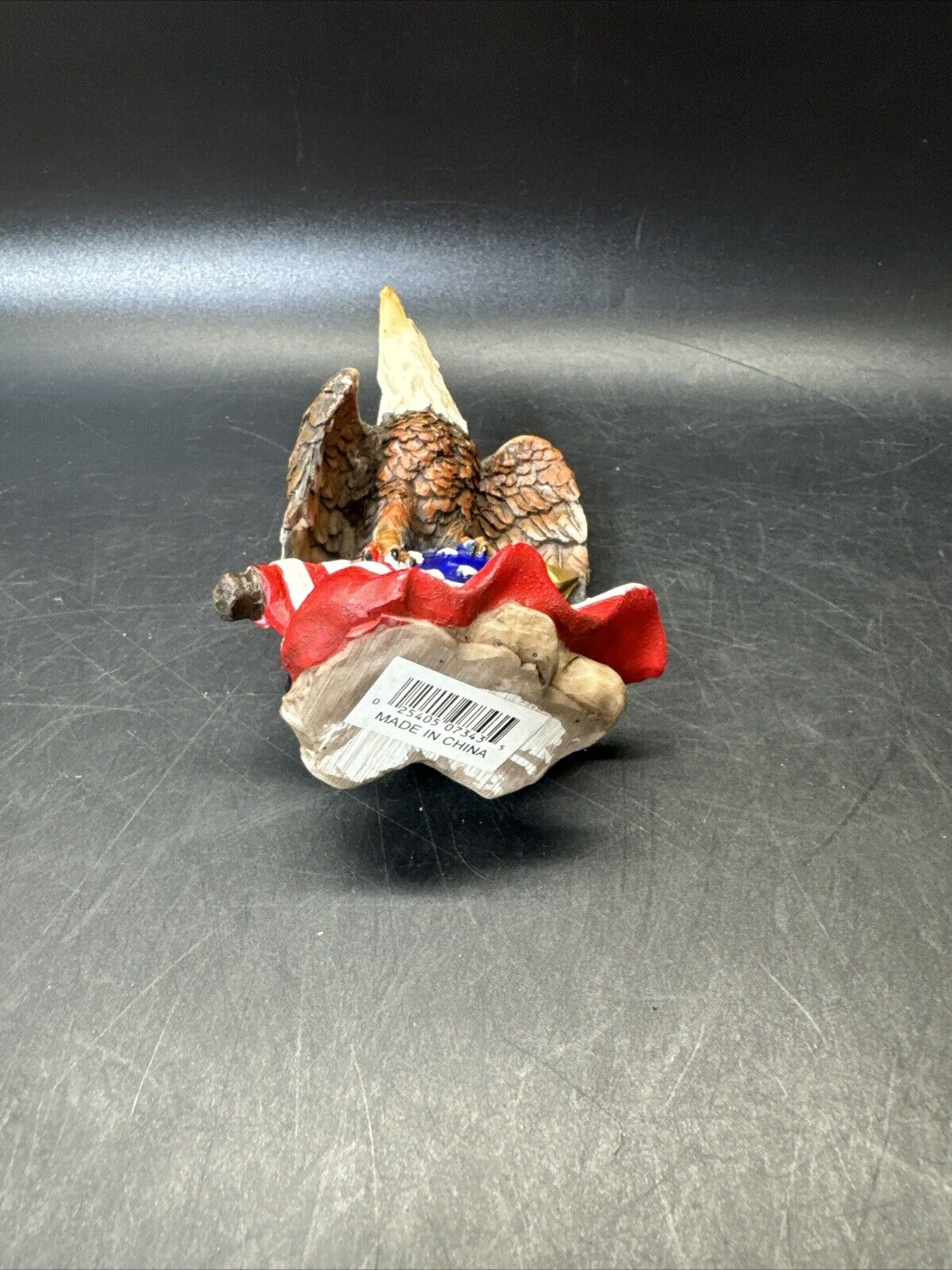 Set of Resting Eagles Figurines On American Flag