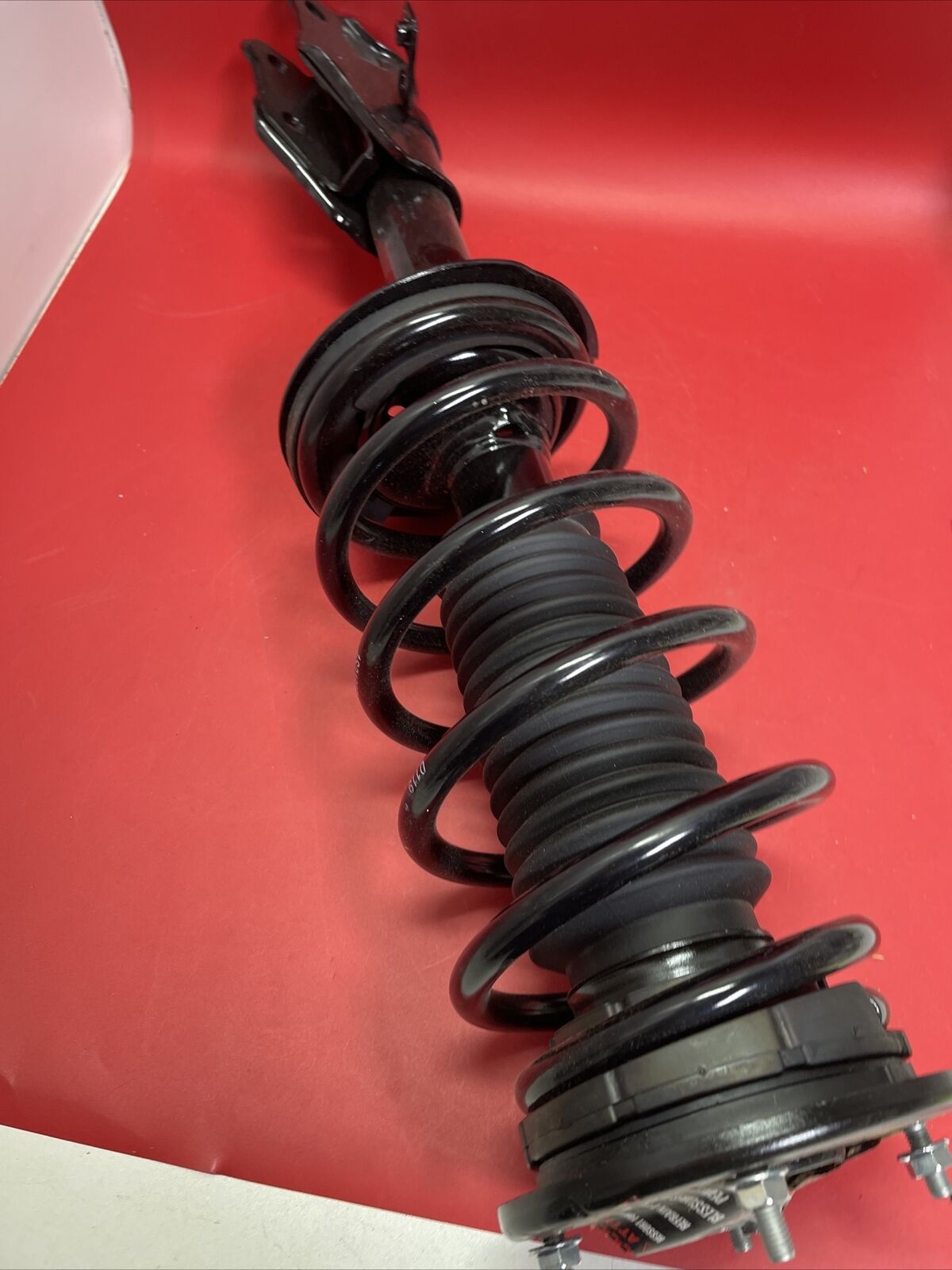 FCS 2331688L Suspension Strut and Coil Spring Assembly