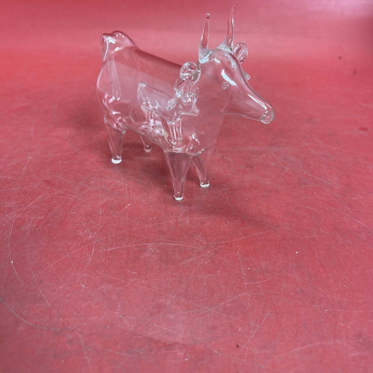 Rare Regency clear glass sculpture of a bull within a bull.