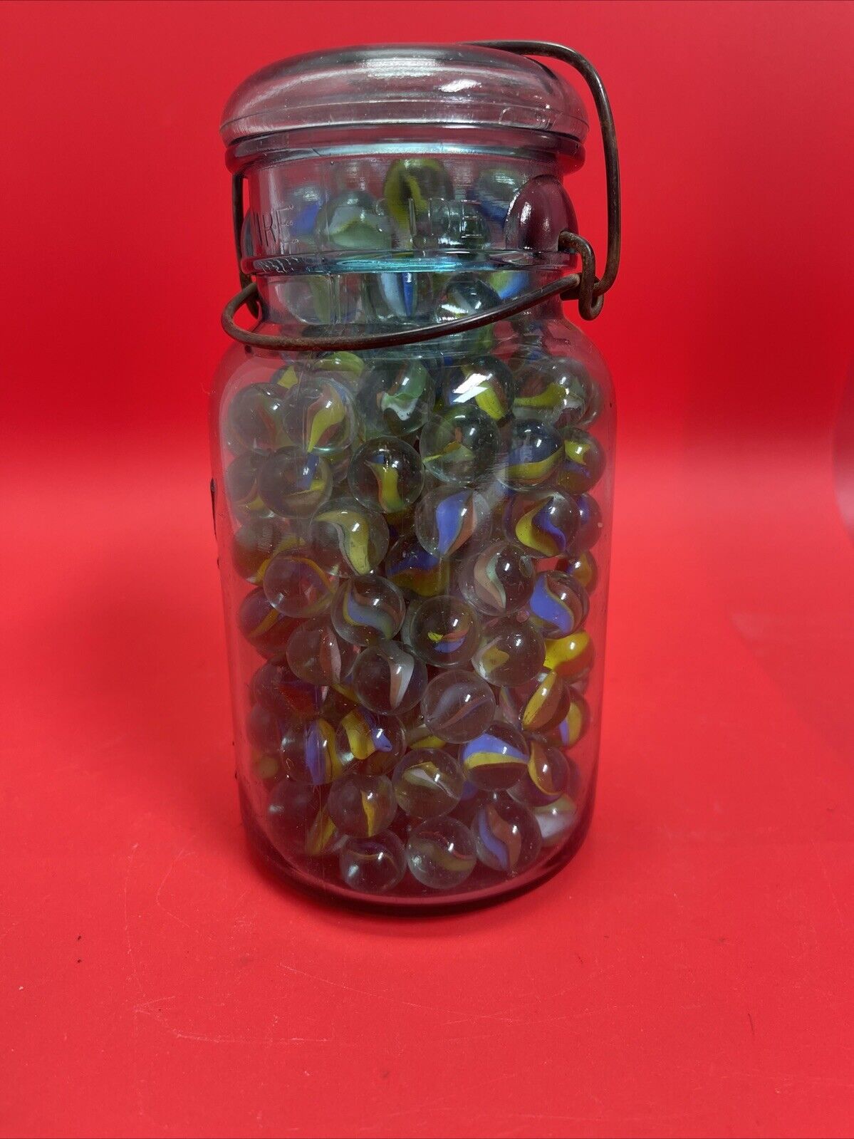 Vintage  Glass Ball Ideal  Jar Filled With Marbles.  Jar Is 7” Tall.#1