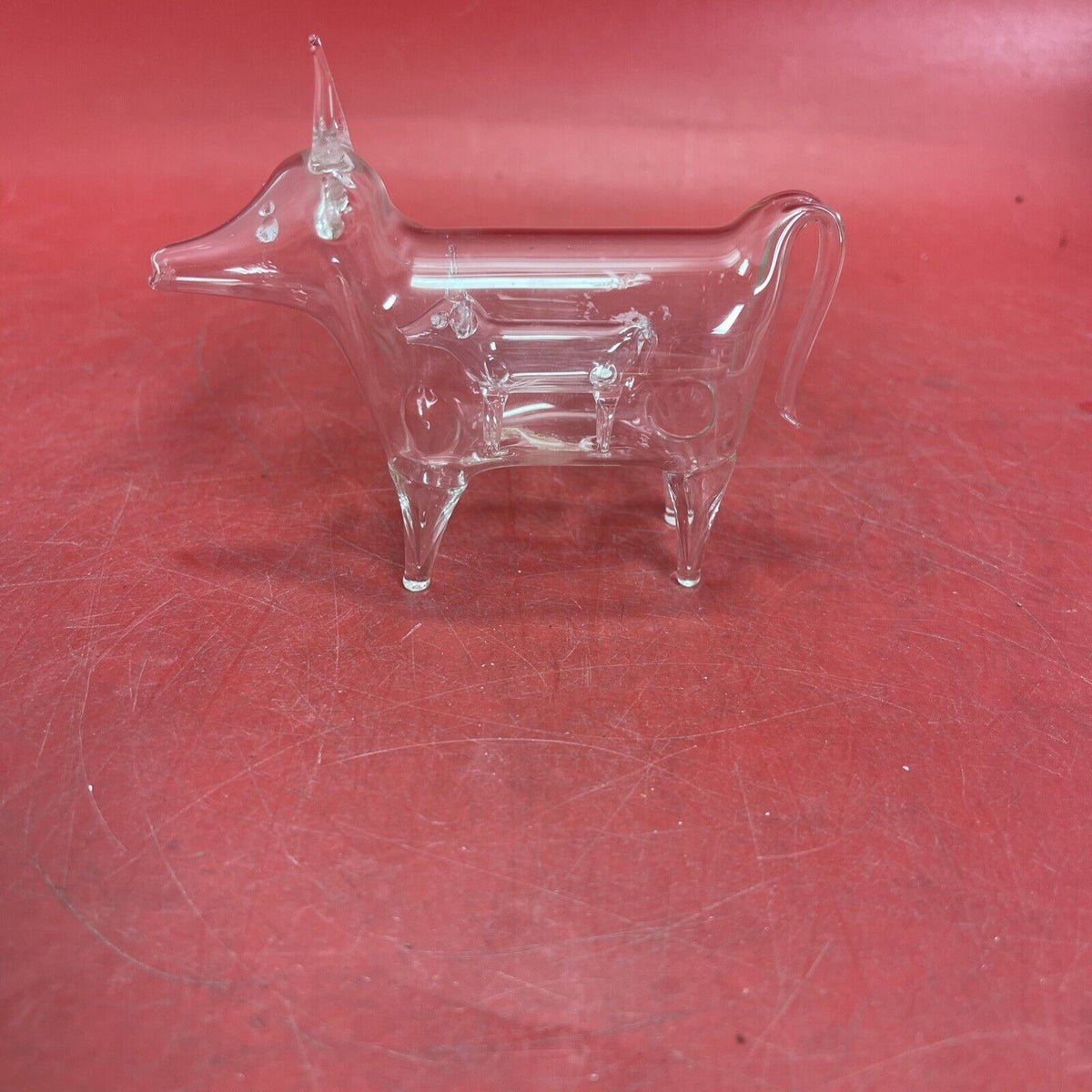 Rare Regency clear glass sculpture of a bull within a bull.