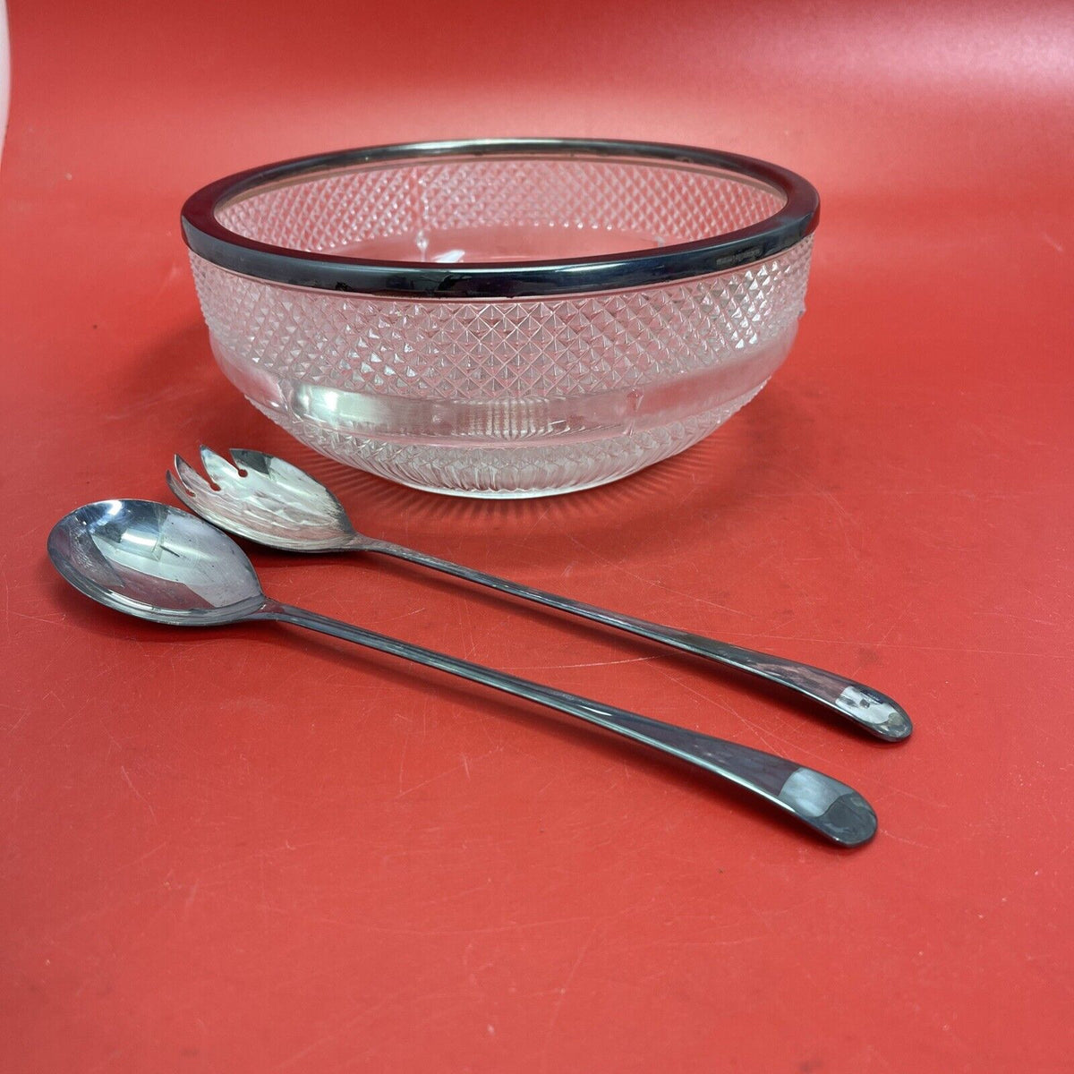 Vintage pressed glass bowl with silver rim and fork with spoon