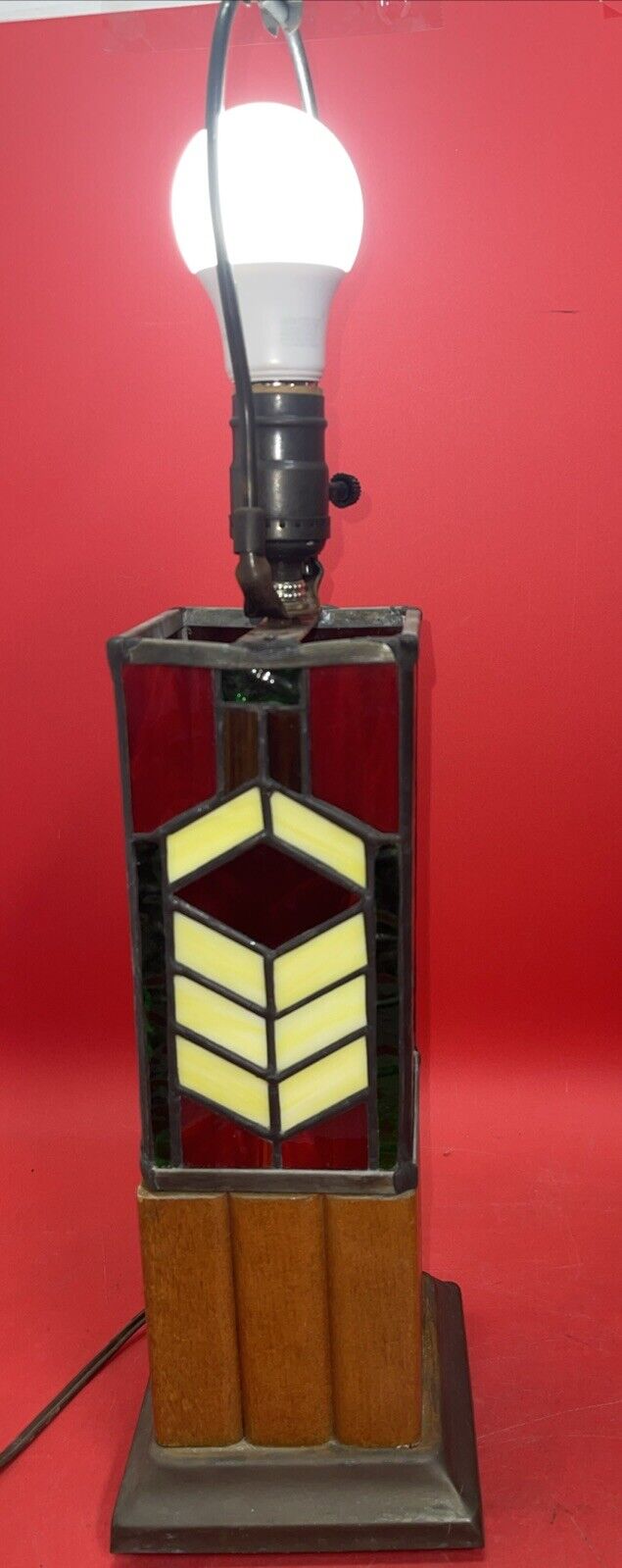 Tiffany style stained glass lamp with geometric pattern on the base