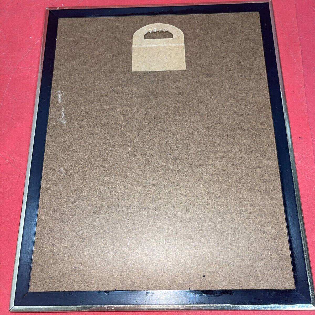 Madonna Of The Streets With Child Plaque  10”x8”in a frame