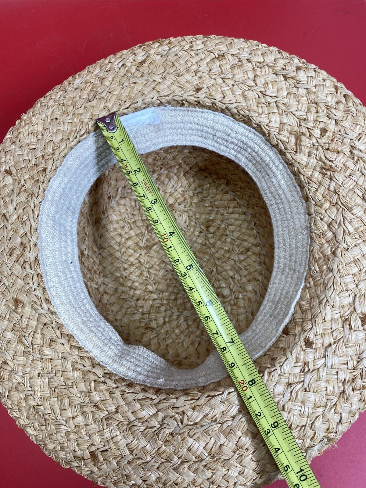 Women's straw hat with a butterfly