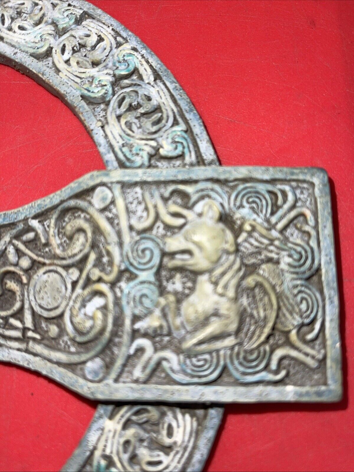 Unique antique round cross with an image of an angel and a unicorn