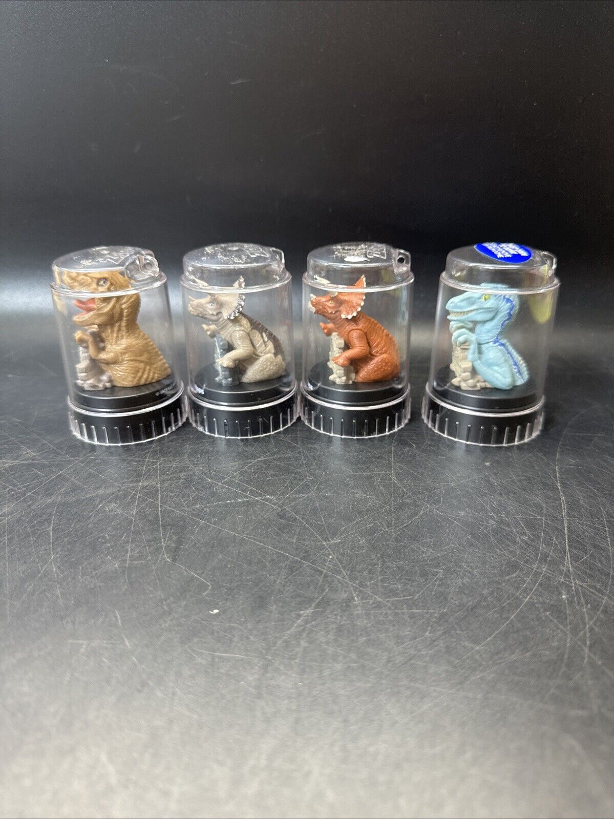 Jurassic World Dinosaur Bottle Topper Pods Lot of 4