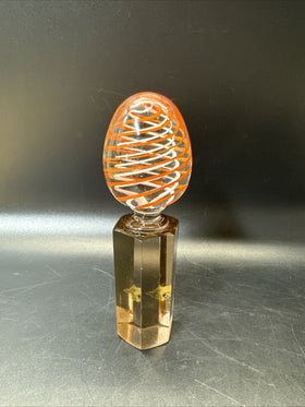 Contemporary White and Orange Core Spiral Marble On The Stand