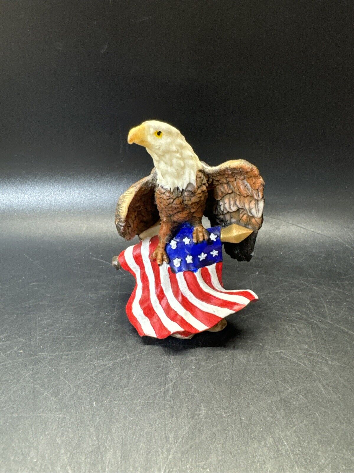Set of Resting Eagles Figurines On American Flag