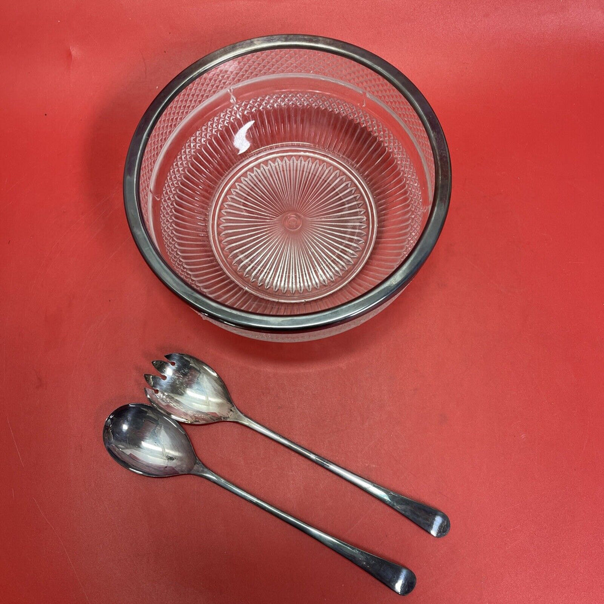 Vintage pressed glass bowl with silver rim and fork with spoon