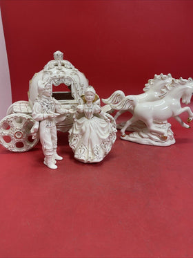 Beautiful porcelain carriage with horses, Cinderella and Prince.