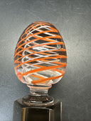 Contemporary White and Orange Core Spiral Marble On The Stand