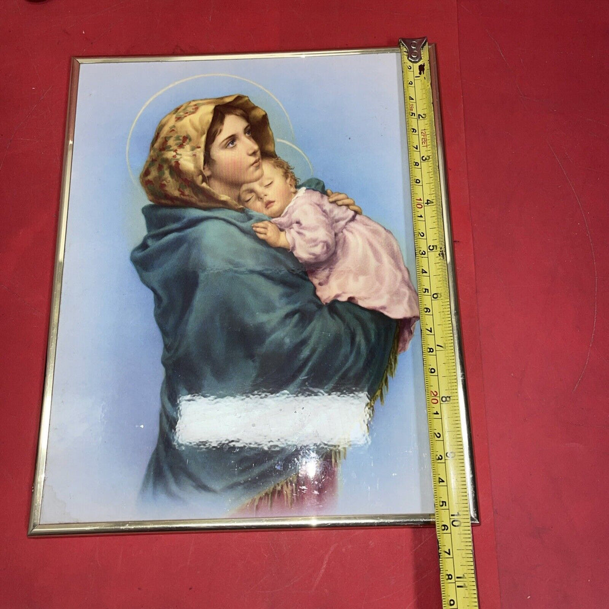 Madonna Of The Streets With Child Plaque  10”x8”in a frame
