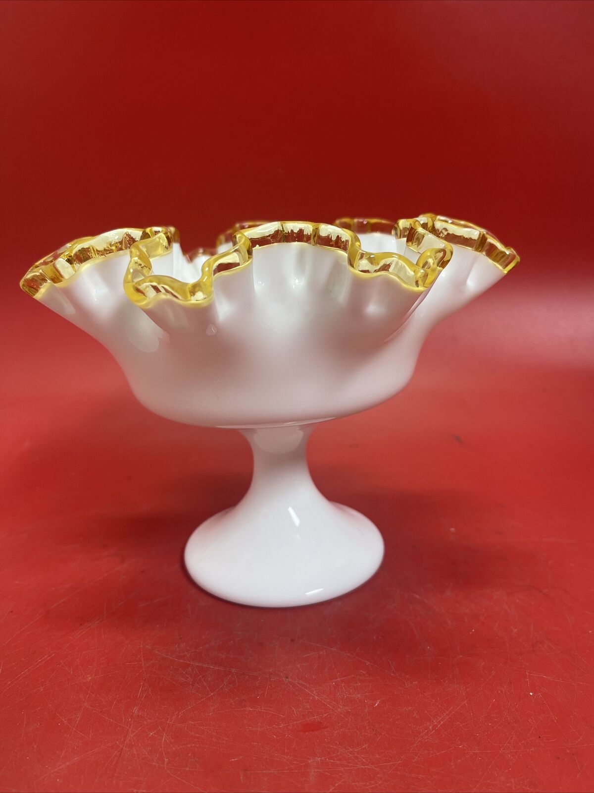 Fenton compote bowl on pedestal with ruffled gold edge