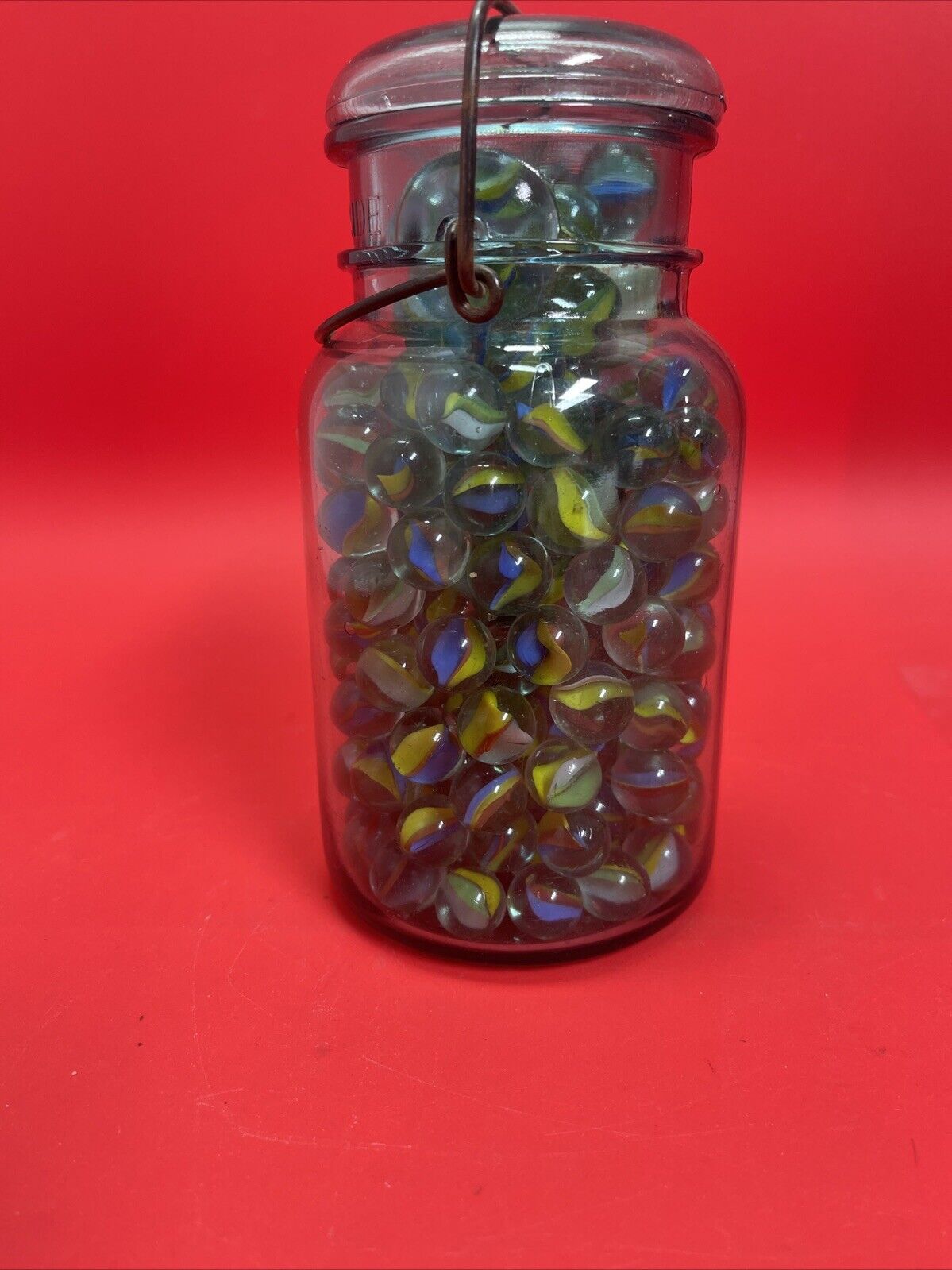 Vintage  Glass Ball Ideal  Jar Filled With Marbles.  Jar Is 7” Tall.#1