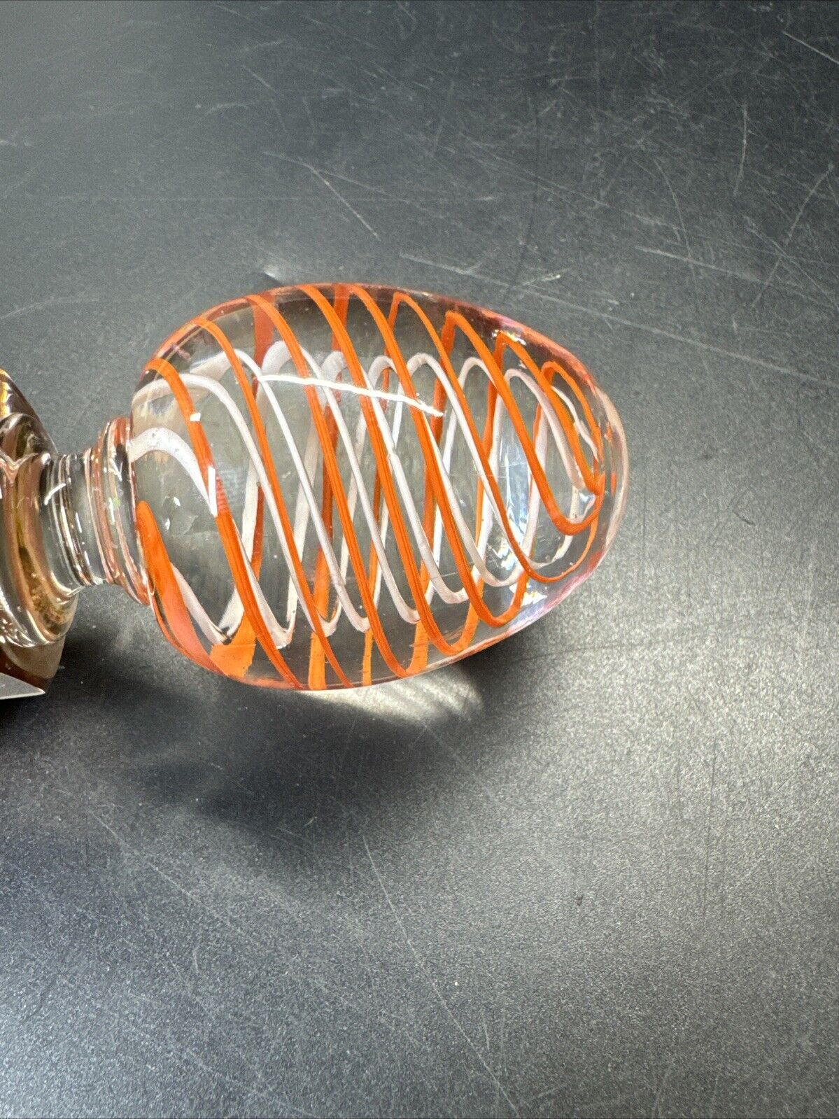 Contemporary White and Orange Core Spiral Marble On The Stand
