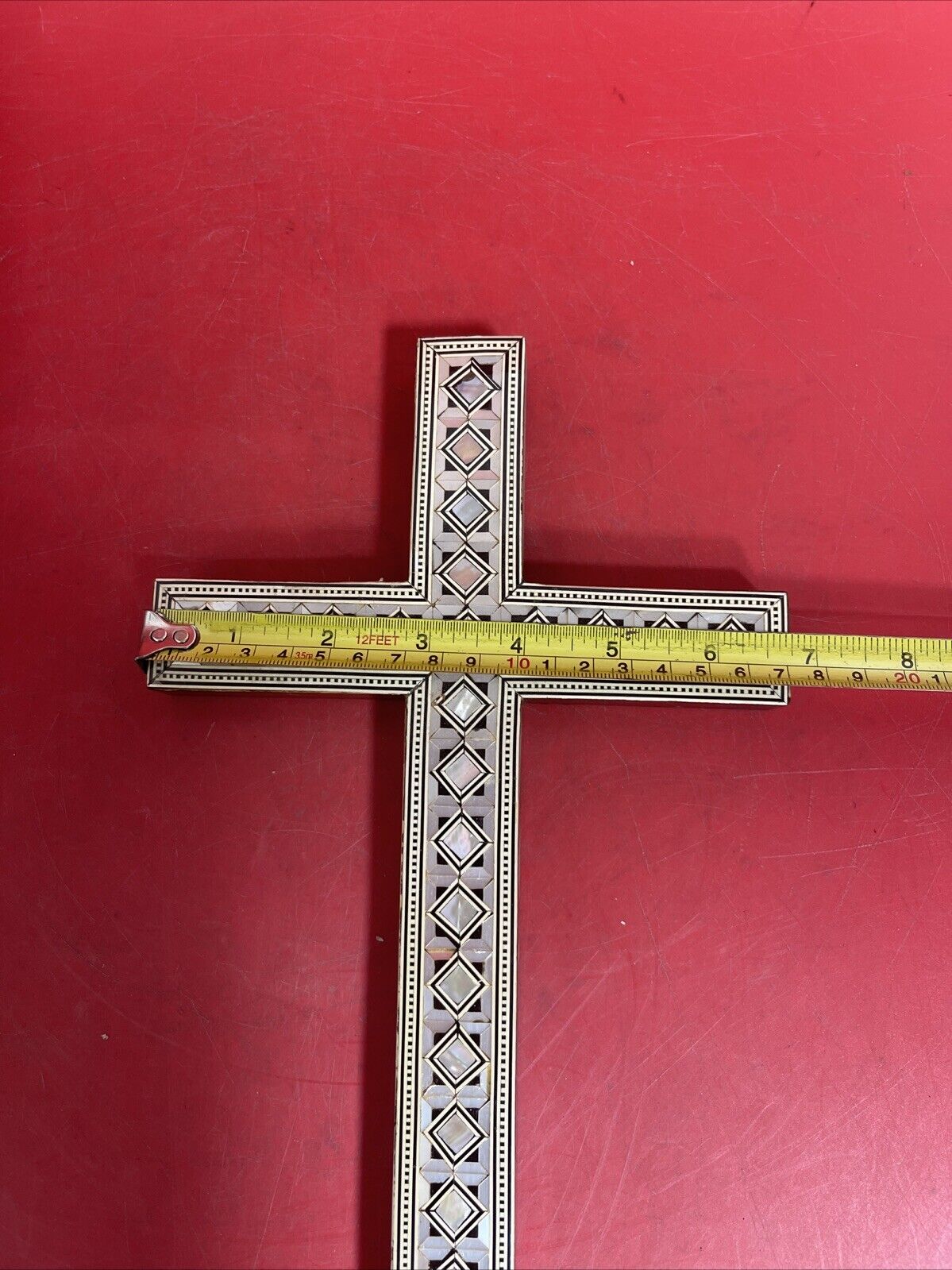 Wooden cross with mosaic covering, on the wall .12”