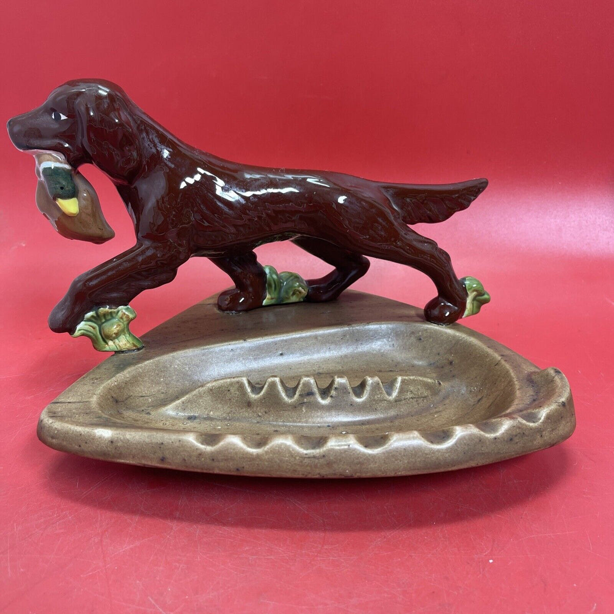 Ceramic figurine Hunting an Irish Setter dog “Duck in the mouth” on an stand