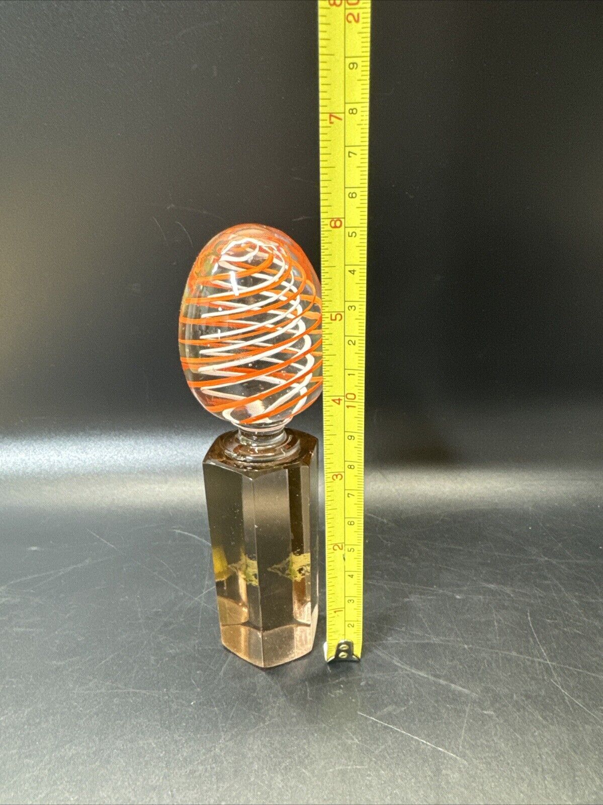 Contemporary White and Orange Core Spiral Marble On The Stand