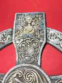 Unique antique round cross with an image of an angel and a unicorn