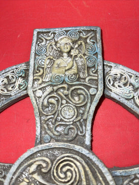 Unique antique round cross with an image of an angel and a unicorn