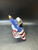 Set of Resting Eagles Figurines On American Flag