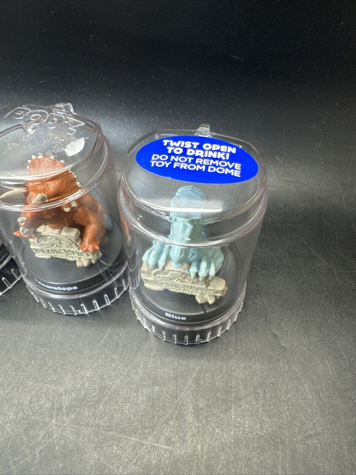 Jurassic World Dinosaur Bottle Topper Pods Lot of 4