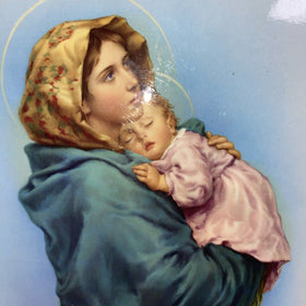 Madonna Of The Streets With Child Plaque  10”x8”in a frame