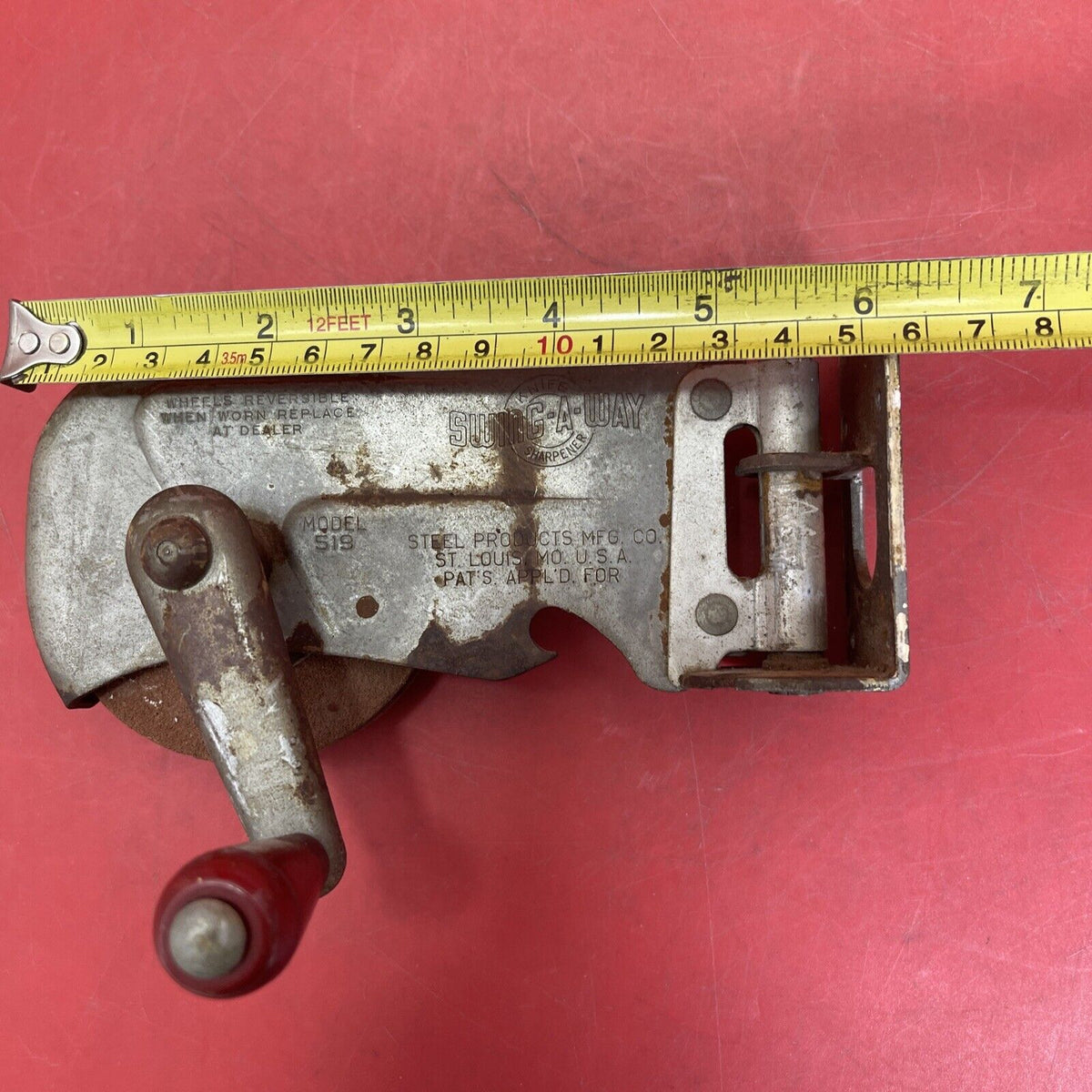 Vintage Swing-A-Way knife sharpener and can opener with wall-mount, Original.