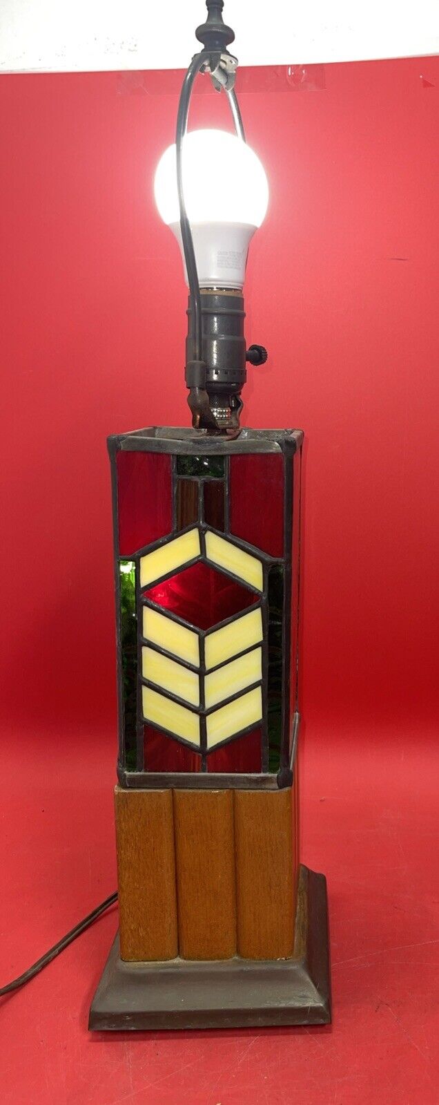 Tiffany style stained glass lamp with geometric pattern on the base