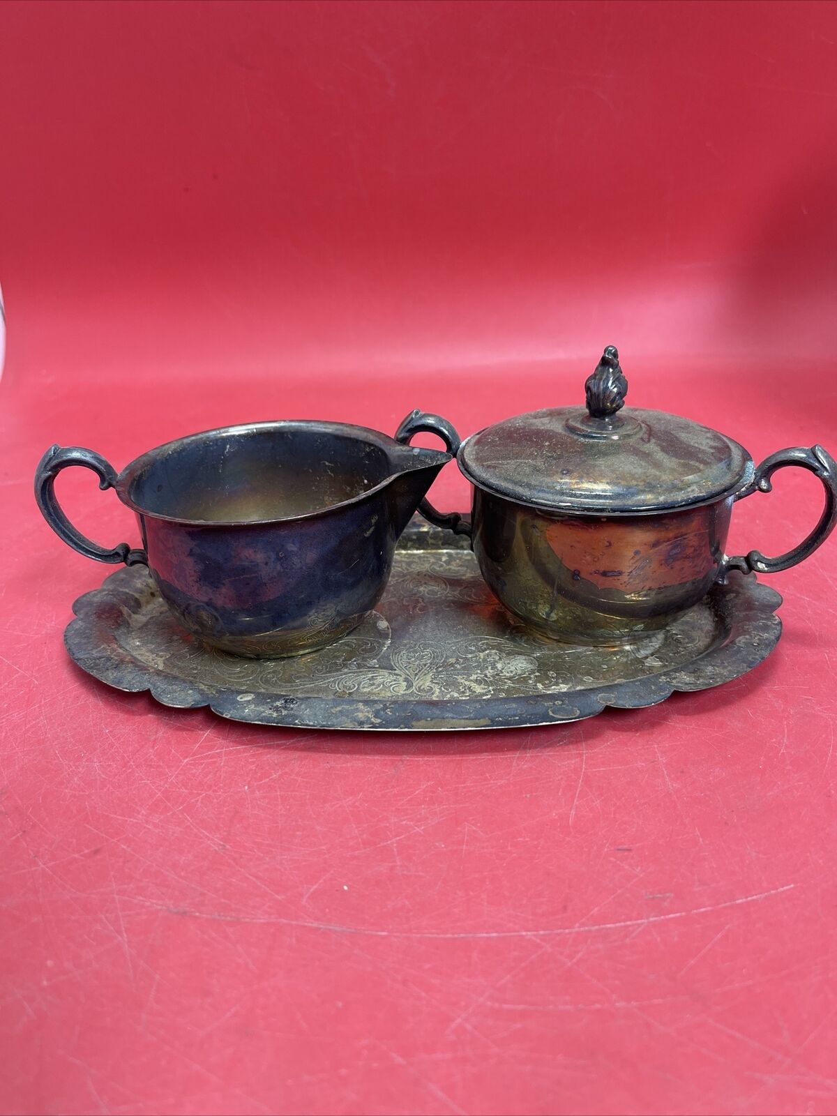 Decorative Sheridan E. P. S. Silverplate lidded sugar bowl ,creamer &tray