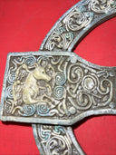Unique antique round cross with an image of an angel and a unicorn