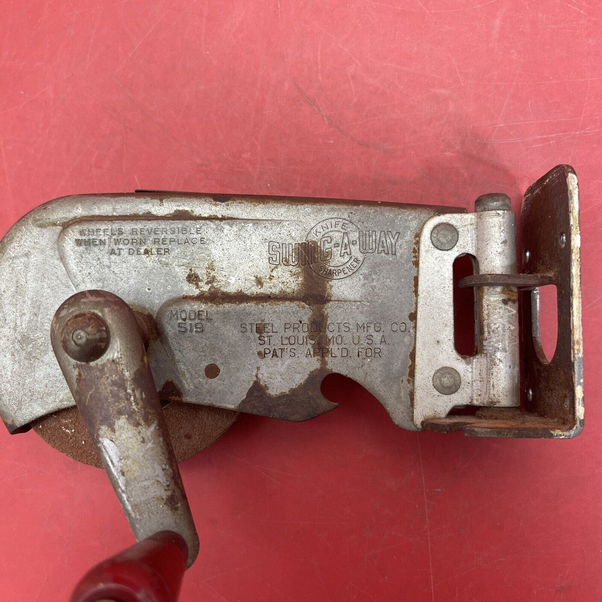 Vintage Swing-A-Way knife sharpener and can opener with wall-mount, Original.