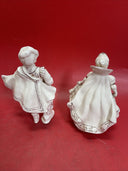 Beautiful porcelain carriage with horses, Cinderella and Prince.
