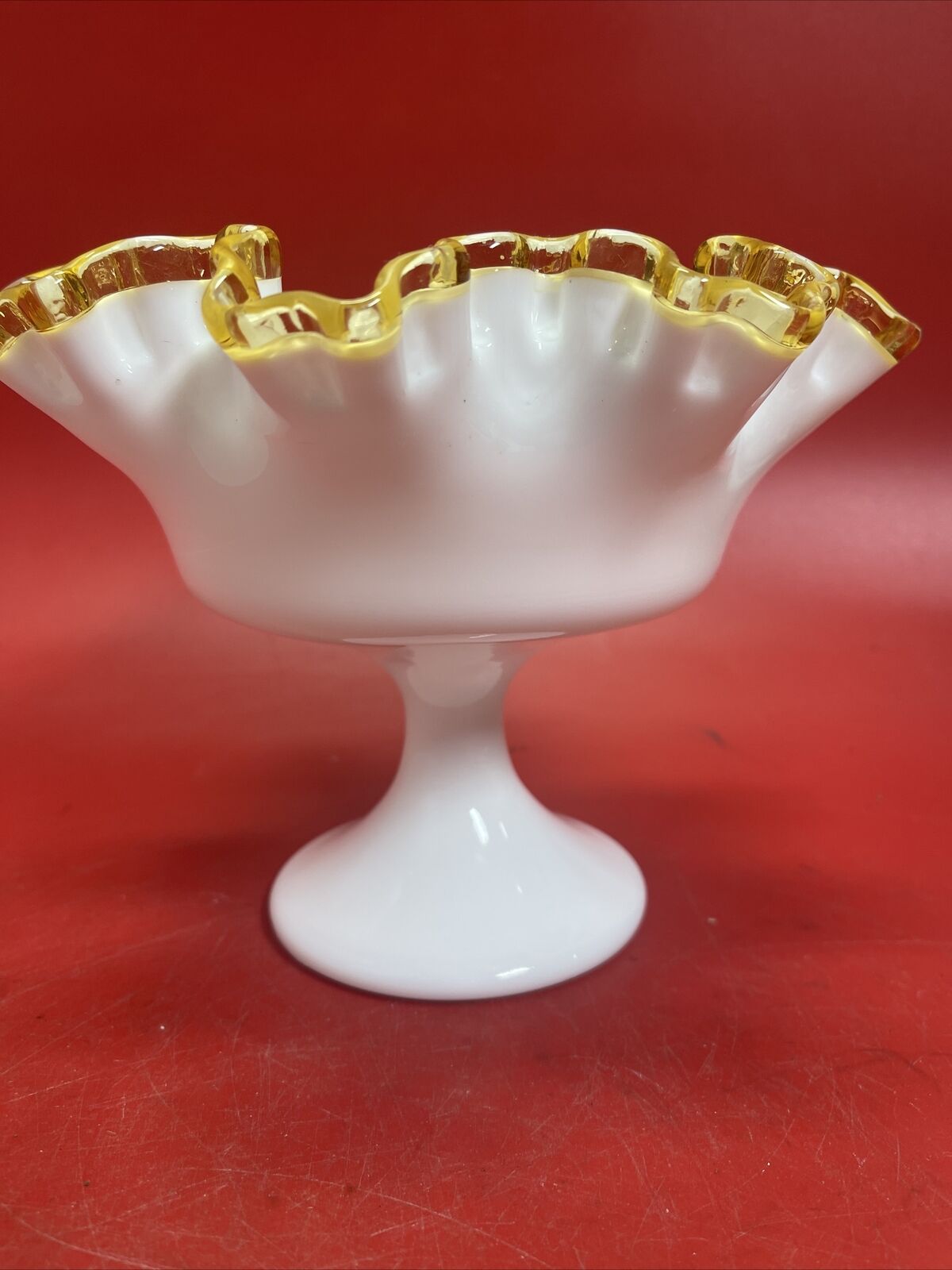 Fenton compote bowl on pedestal with ruffled gold edge