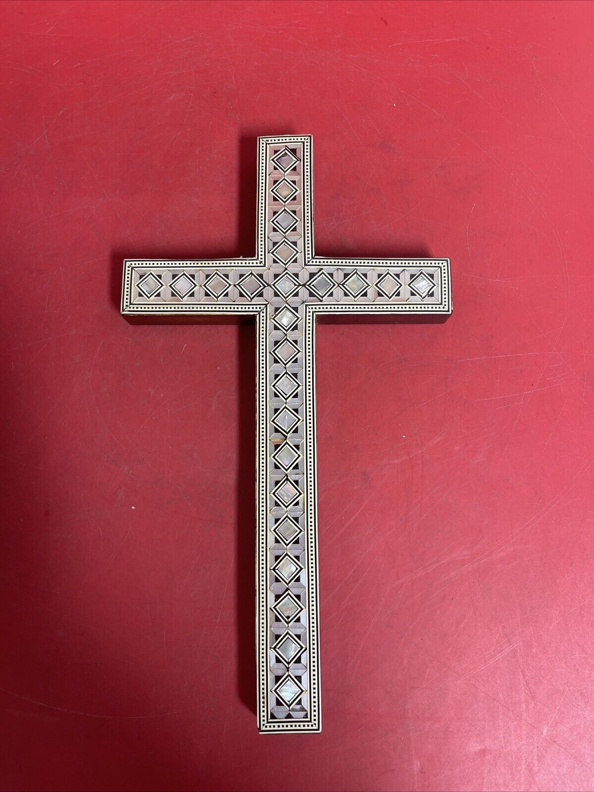 Wooden cross with mosaic covering, on the wall .12”