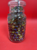 Vintage  Glass Ball Ideal Jar Filled With Marbles.  Jar Is 7” Tall.