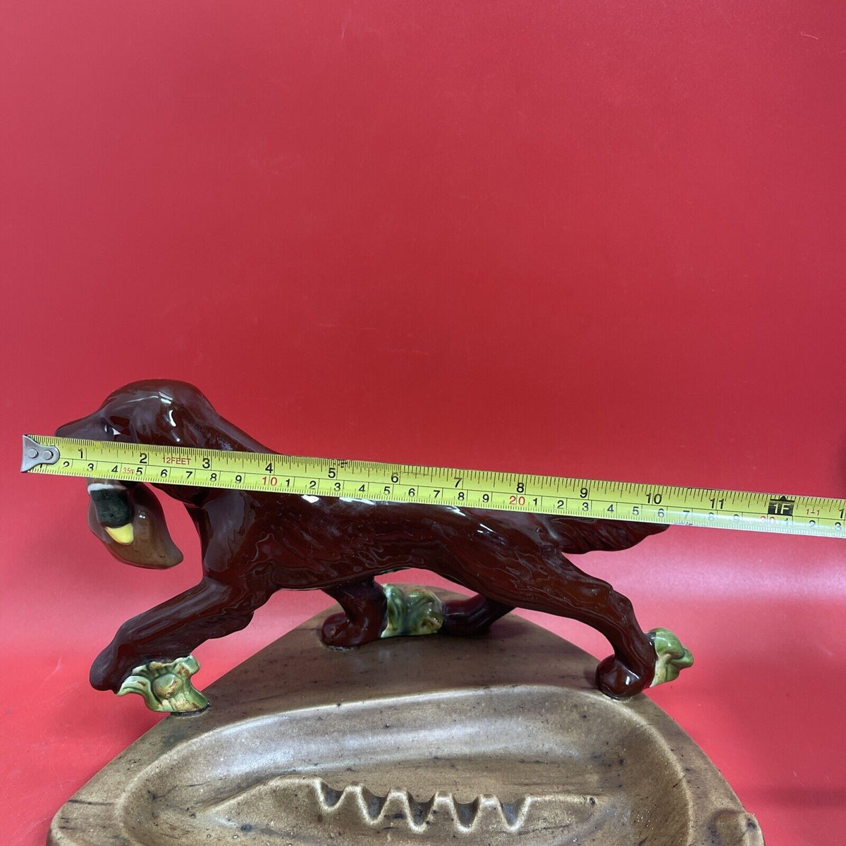 Ceramic figurine Hunting an Irish Setter dog “Duck in the mouth” on an stand