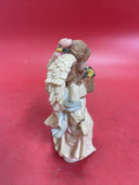 Vintage figurine ANGEL with flowers