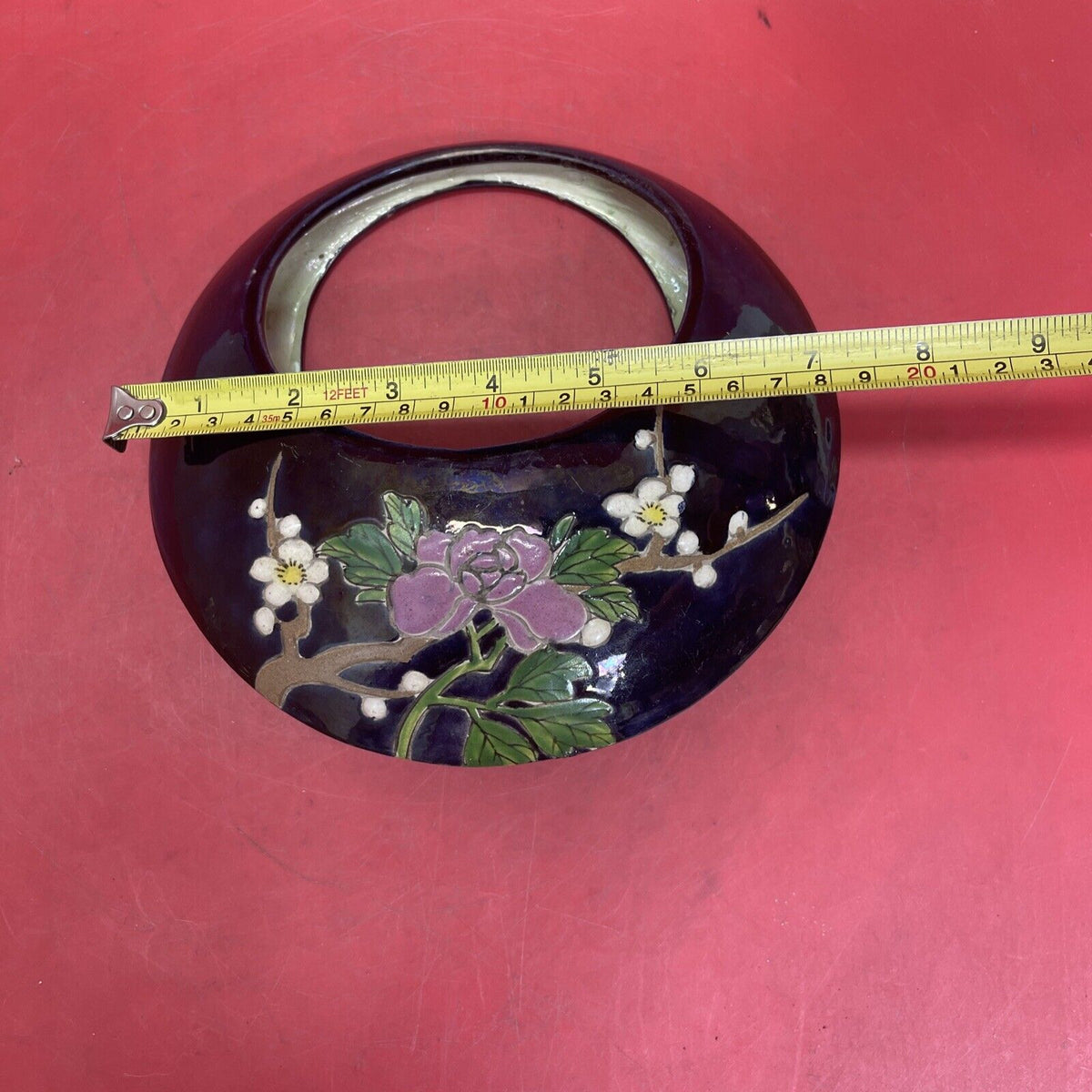Japanese vase in the shape of a crescent, vintage embossed flowers
